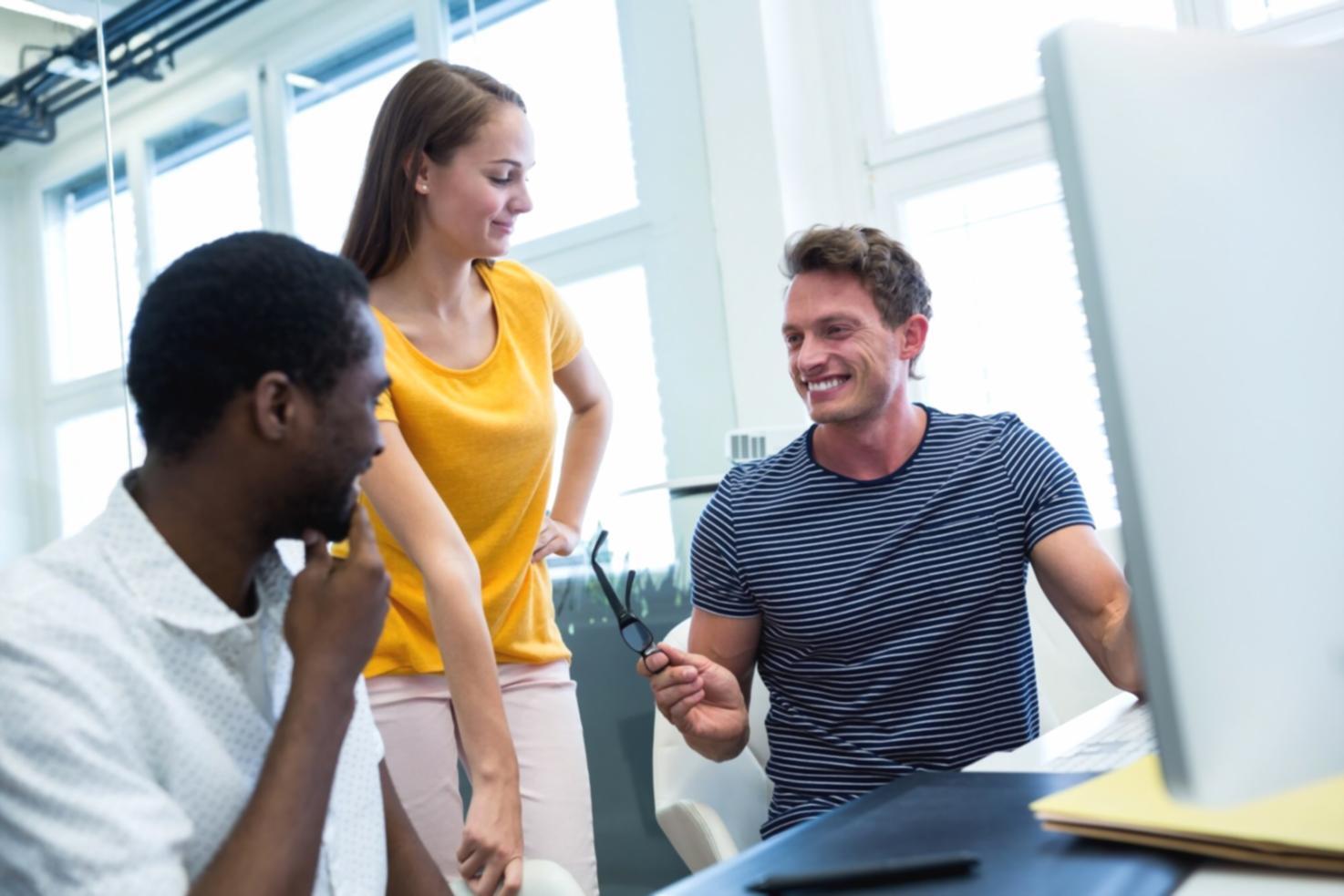 Professional financial advisor consulting with client in modern office environment